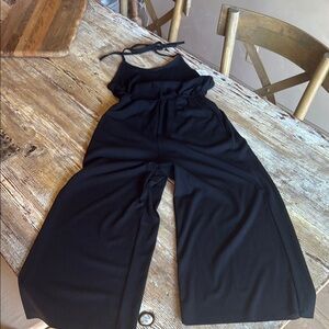 Urban Outfitters halter black cotton jersey cropped flare jumpsuit BNWT